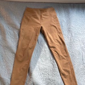 Capri leggings, size small color beige. Has pockets